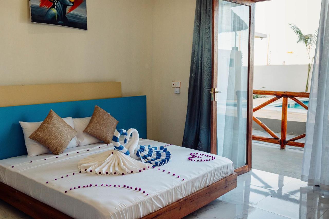 Ocean Breeze Hotel Нунгви Экстерьер фото
