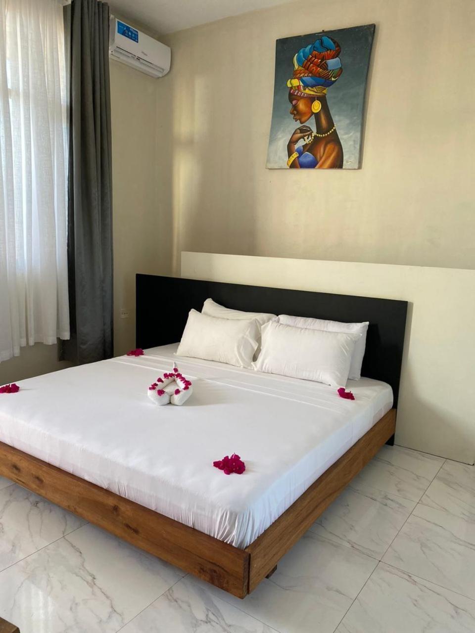 Ocean Breeze Hotel Нунгви Экстерьер фото